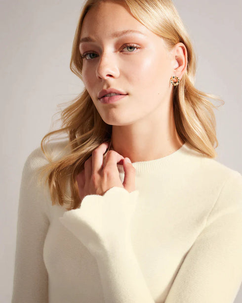 HAZALEN-Knitwear-Upgrade your knit drawer with the HAZALEN top. Its long fluted sleeves add a touch of drama to your every gesture, while a crew neck keeps things timeless and versatile. Knitted top Long fluted sleeves Crew neck Scalloped edge Peplum waist Stretch fabric- Ted Baker Romania